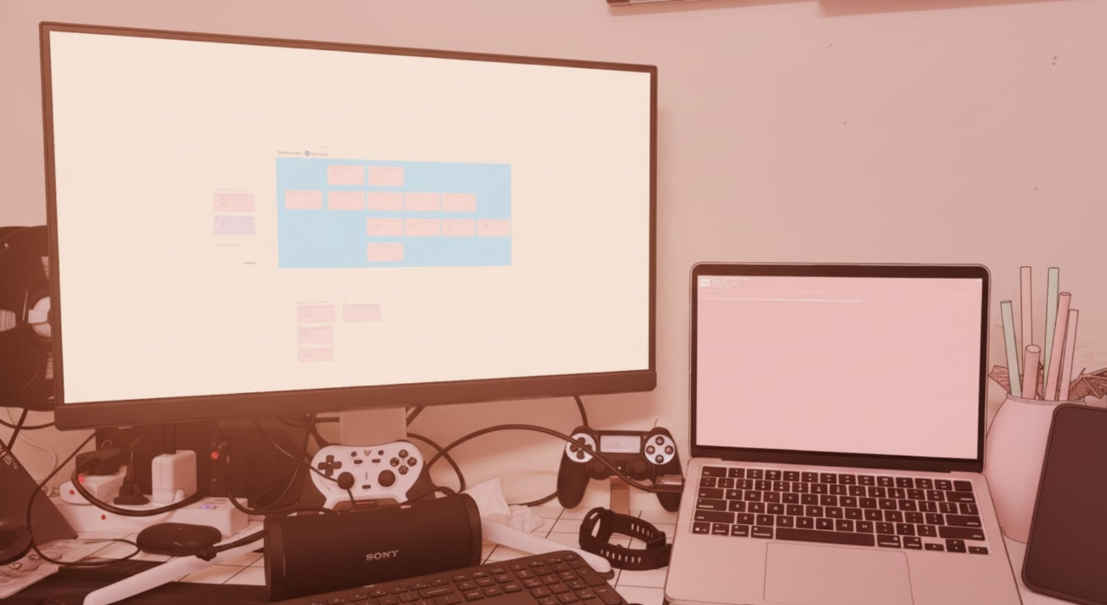A desk with Figma and a terminal side by side.